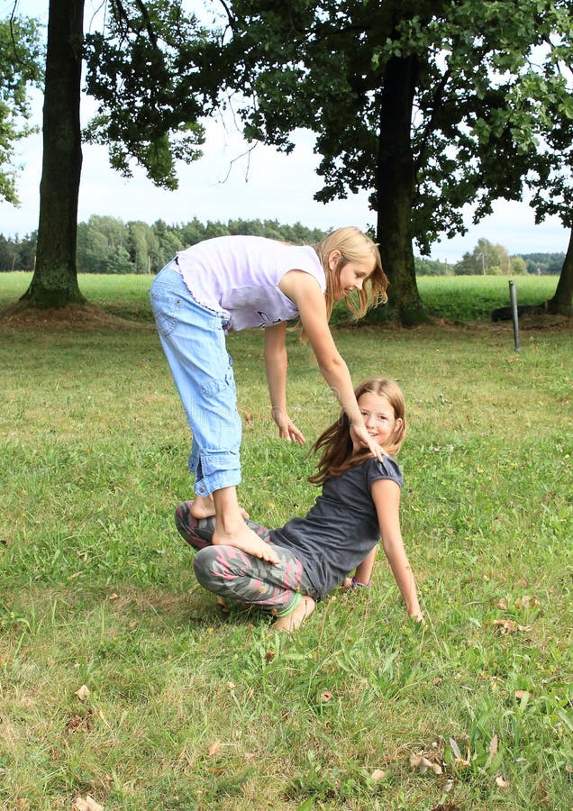 Two Girls Playing With Each Other