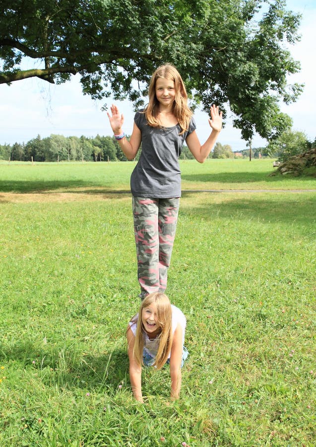 Two Girls Playing With Each Other