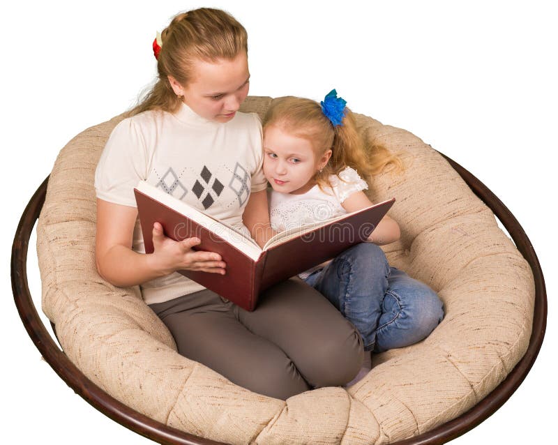 Two girls reading book isolated on white royalty free stock photo Two girls reading book isolated on white royalty free stock photo