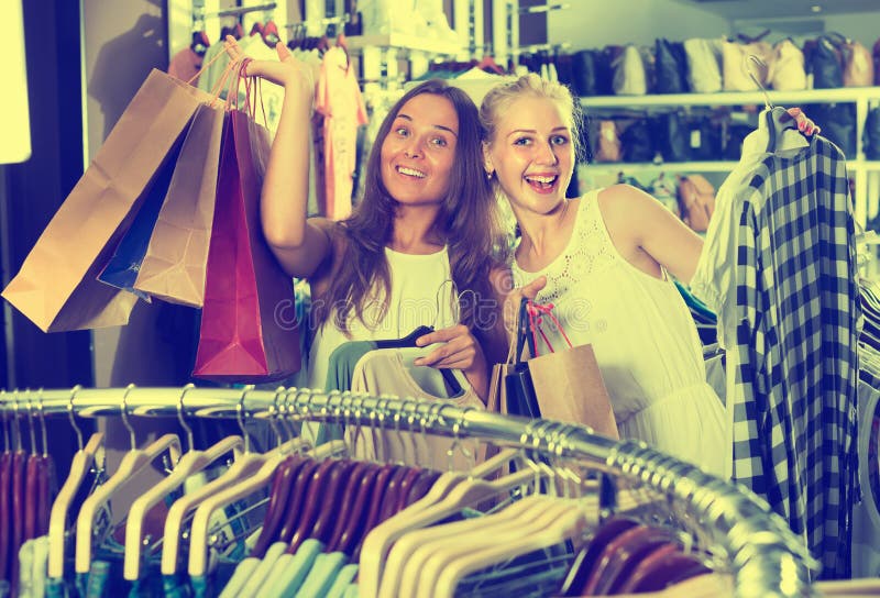 Two Girls With Shopping Bags In Shop Stock Image Image Of Market