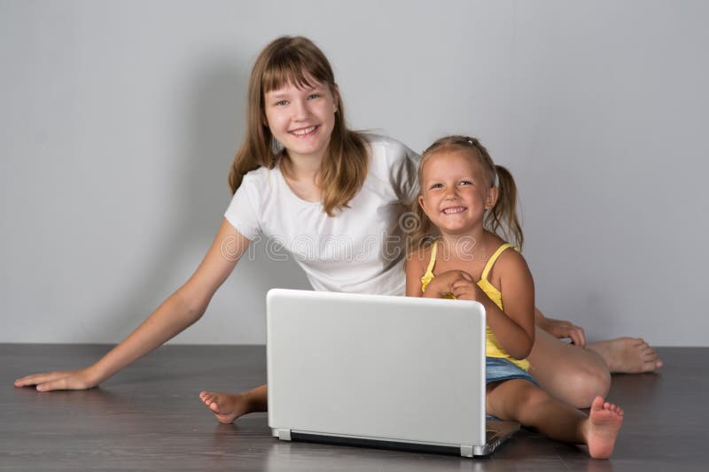 Two girls sisters teenager and child