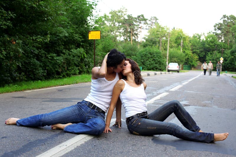 Two girs at road