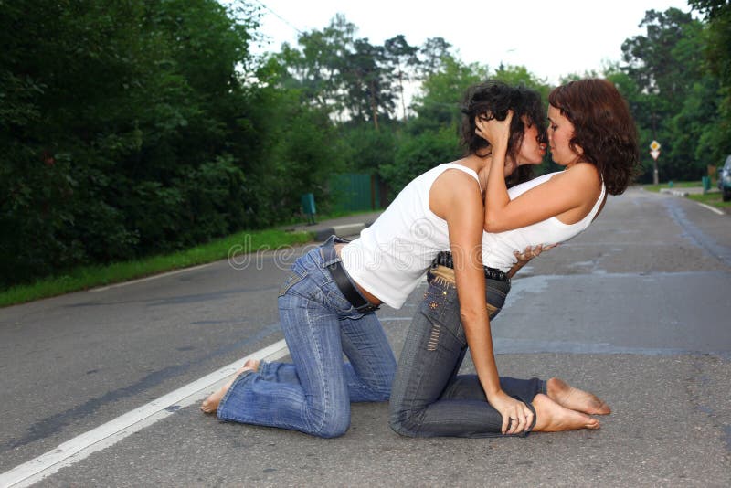 Two girs at road