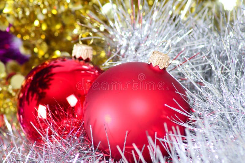 Two glass New Year s balls in a tinsel
