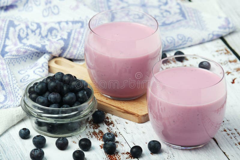 Two glasses with blueberry yogurt stock image Two glasses with blueberry yogurt stock image