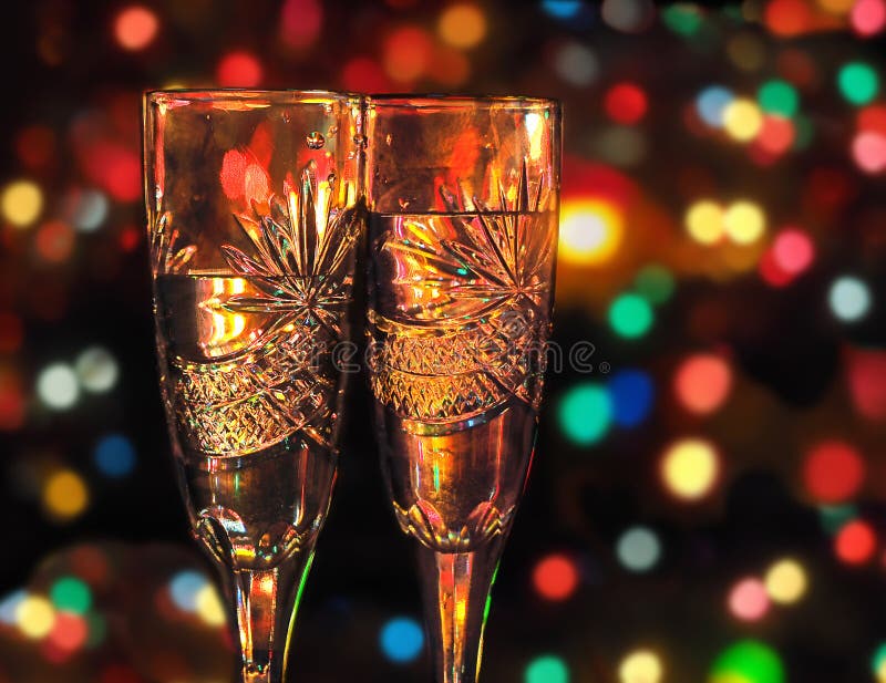 Two glasses with champagne against festive background stock photos Two glasses with champagne against festive background stock photos