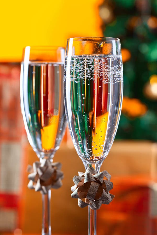 Two Glasses with Champagne and Christmas Ornaments Stock Photo Image