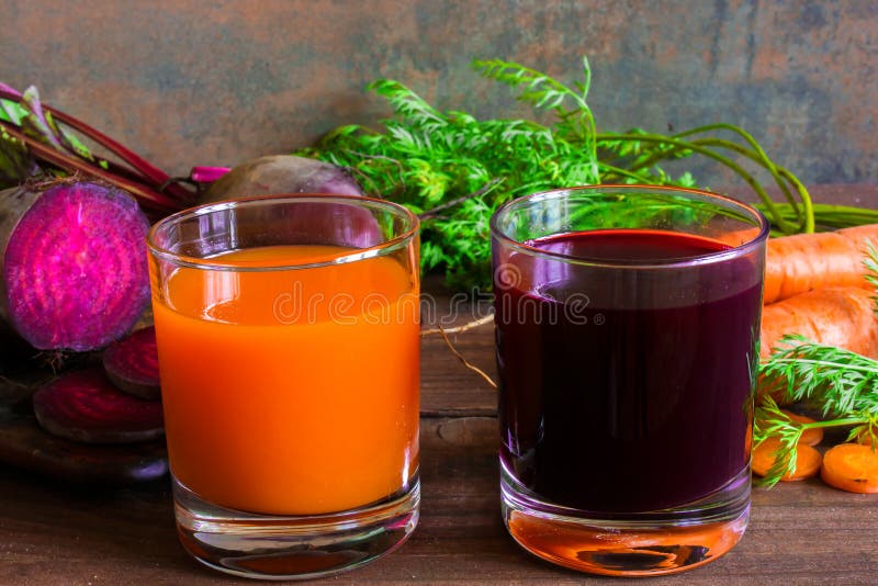 Two glasses of fresh carrot and beetroot juice. healthy drink royalty free stock image Two glasses of fresh carrot and beetroot juice. healthy drink royalty free stock image