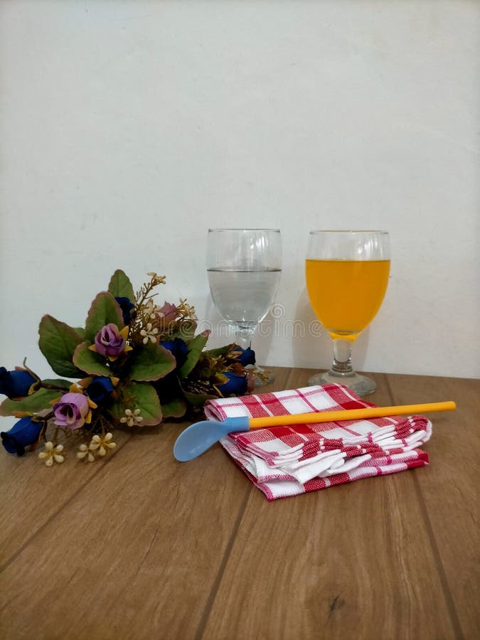 Two Glasses, Napkin and Flower at Wall Background Stock Photo Image of wall, napkin 225341366