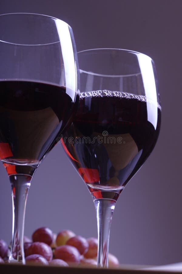 Two glasses of red wine stock image. Image of drunken, cheers 881095