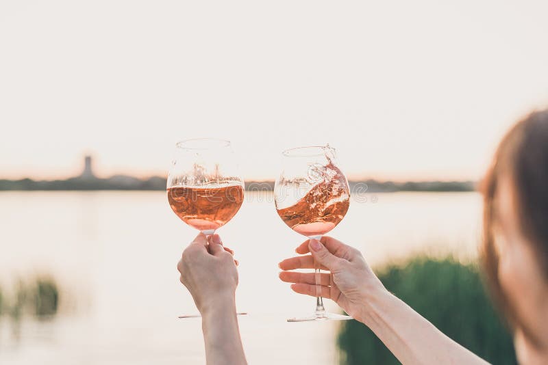 Two Glasses of Rose Wine and Peony Bouquet on the Sunset Picnic. Stock ...