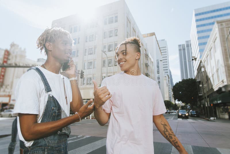 Two guys hanging out in LA stock photo. Image of fashionable 126101982