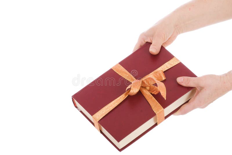 Two hands and the book in gift packing isolated