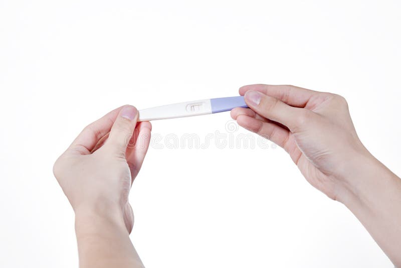Two hands holding Positive Pregnancy Test on Isolated White royalty free stock image Two hands holding Positive Pregnancy Test on Isolated White royalty free stock image