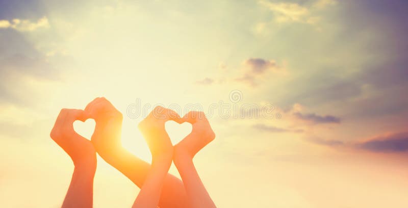 Two hands on sunsut.