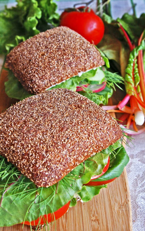 Two Healthy Rye Bread Sandwiches on a Wooden Board Stock Photo Image