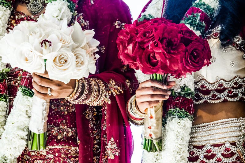 two-indian-wedding-bouquets-brides-red-white-traditional-41083159.jpg