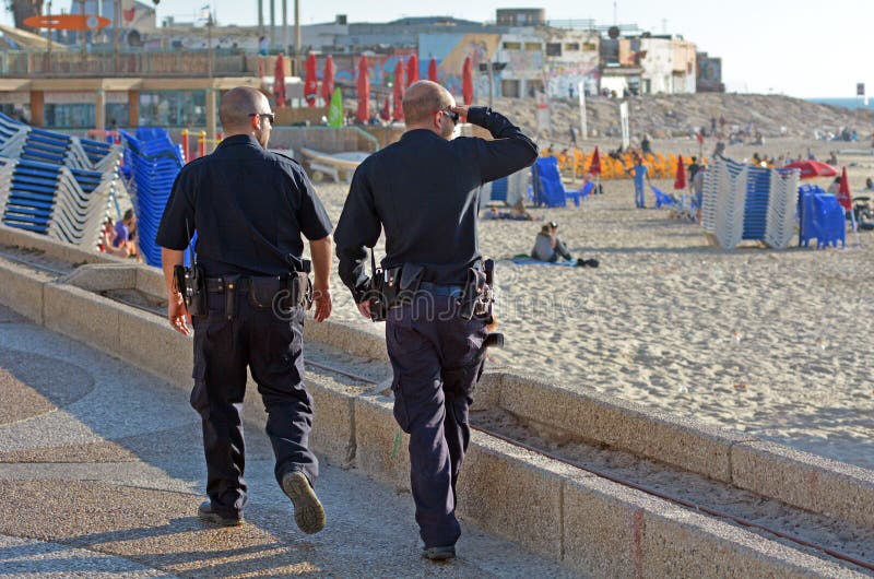 Two Israel Police officers patrolling on Tel Aviv waterfront