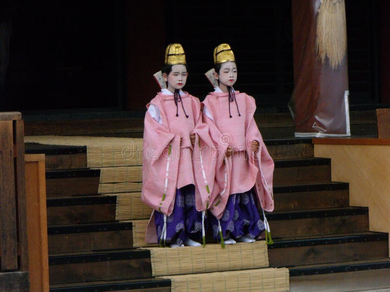 Two Japanese children dressed in traditional kimono in a Kyoto temple stock image