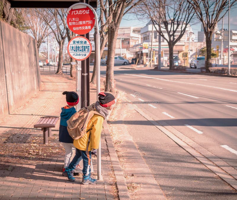 at the bus stop