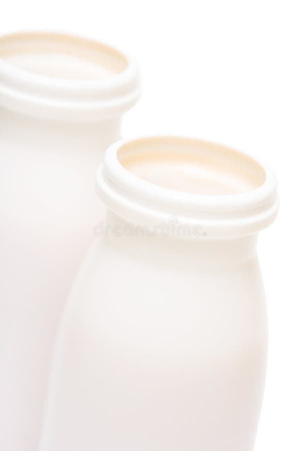 Two jars with milk