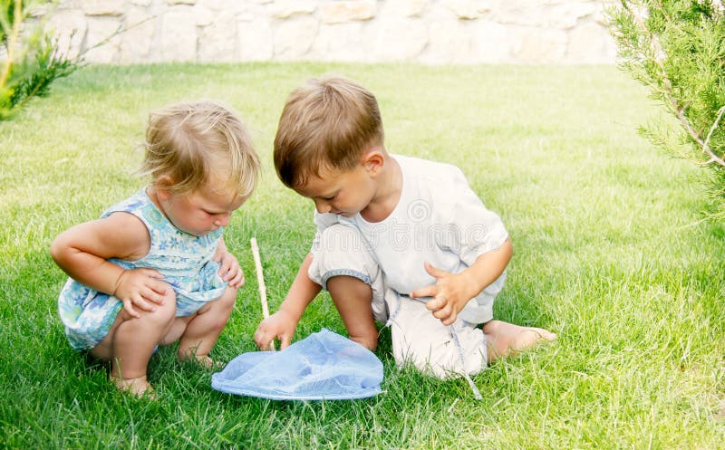 Two kids with butterfly net