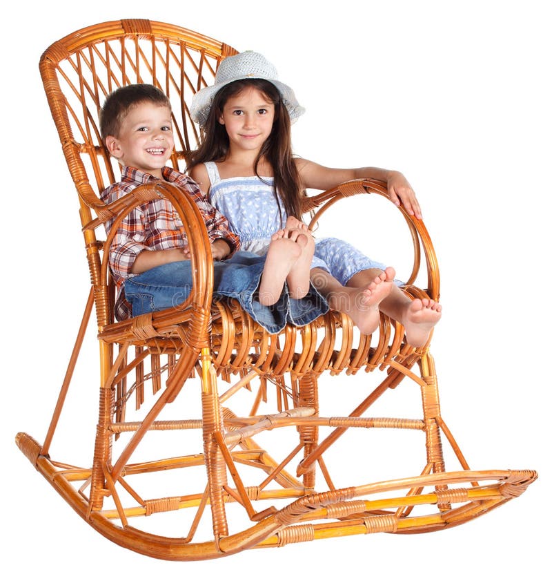 Two Kids Sitting In The Rocking Chair Stock Image - Image 