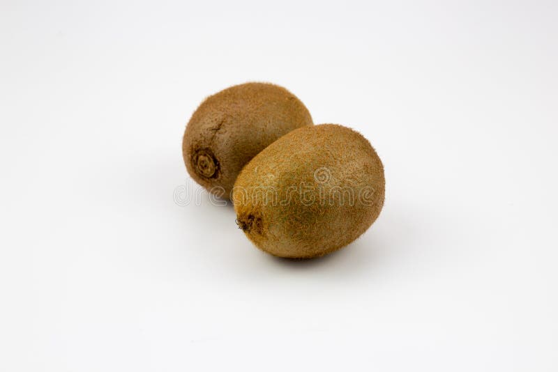 Two kiwi fruits on background stock photography