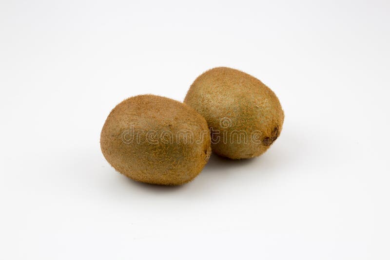 Two kiwi fruits on background stock image