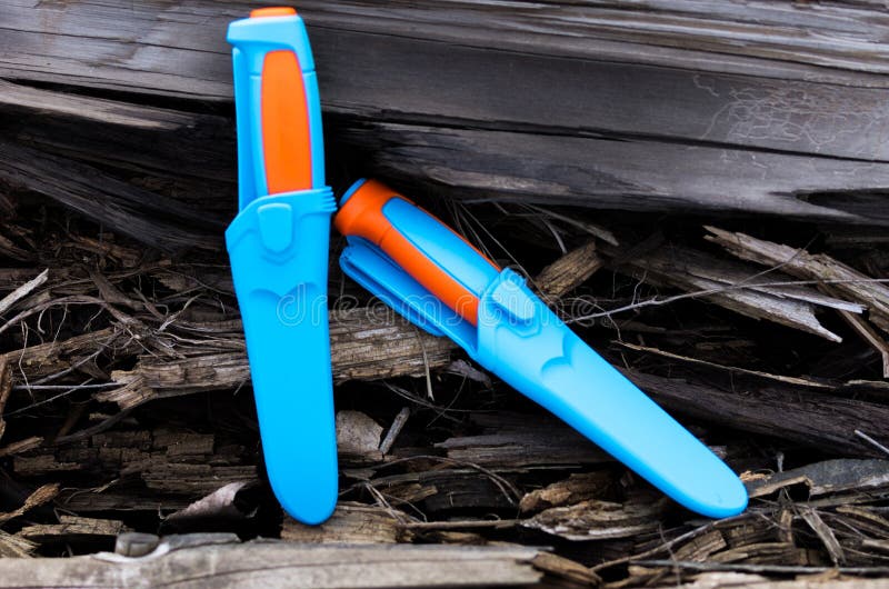 Two Knives in Plastic Sheath. Warm and Cold Tone Stock Photo Image of