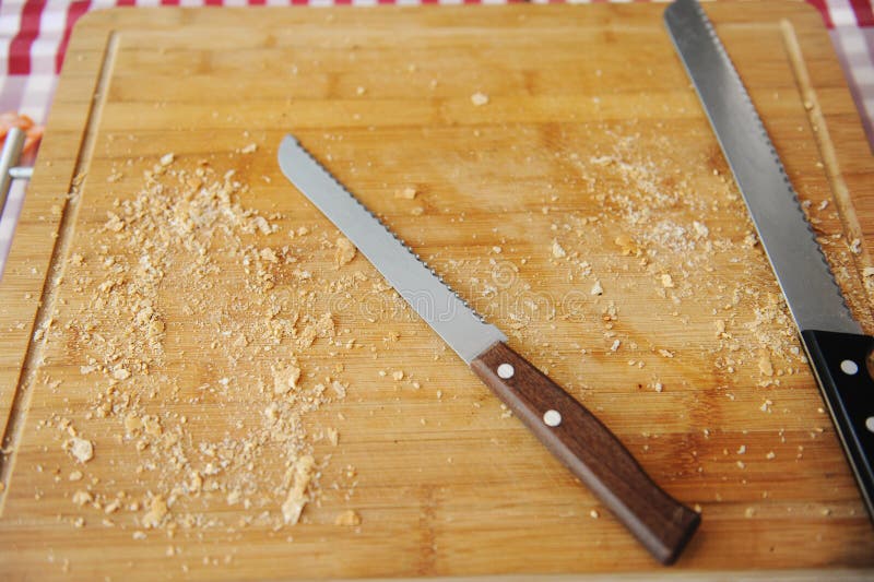 Two Large Bread Knife on a Cutting Board Stock Photo Image of meal