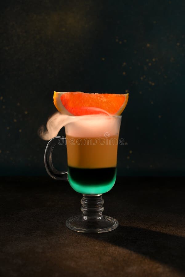 Two-layer Coffee Cocktail Mint And Red Orange. Cold Smoke Leaks Out.