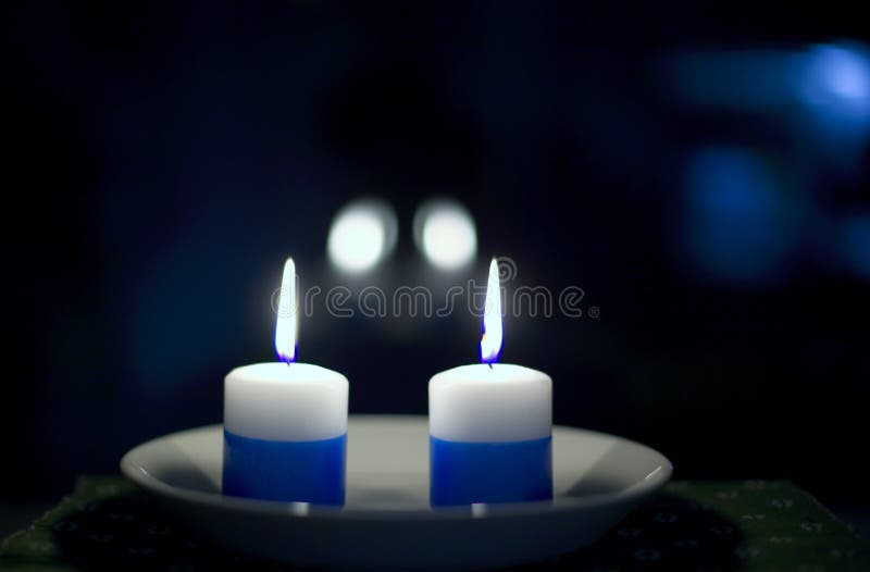 Two lit candles