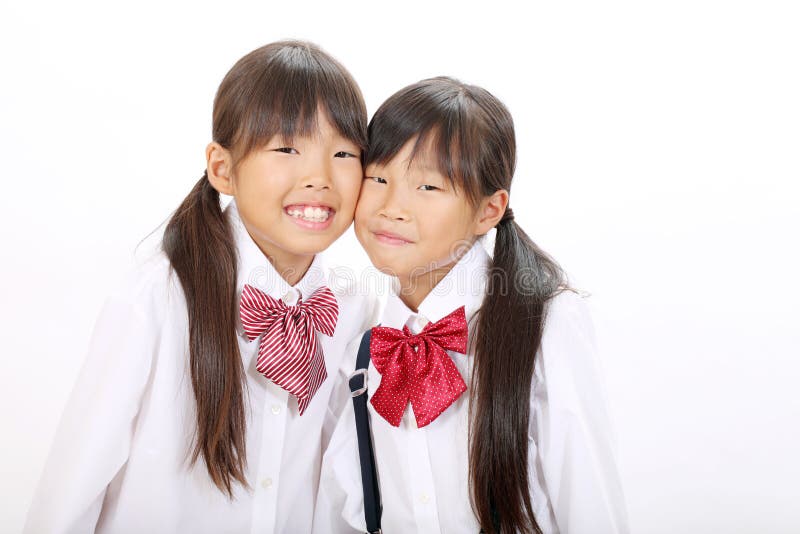 Two little asian schoolgirls