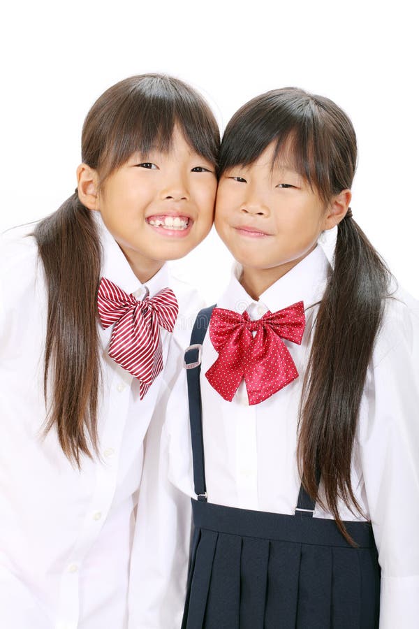 Two little asian schoolgirls