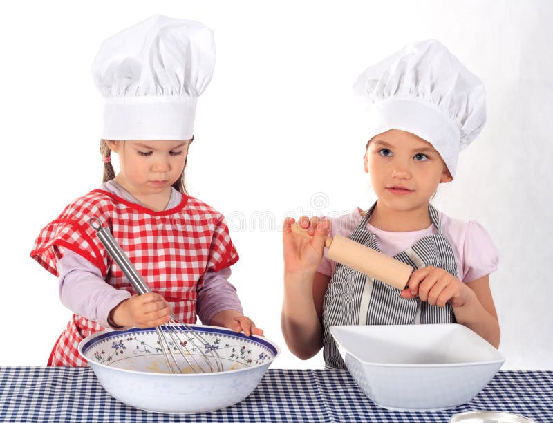 Two little girls in the cook costume