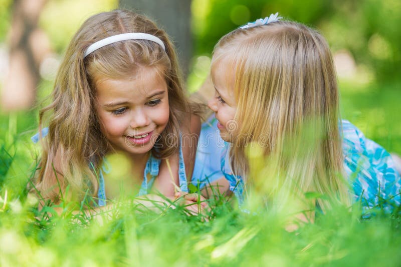 Two Little Sisters Having Fun in Summer Park Stock Image - Image of ...