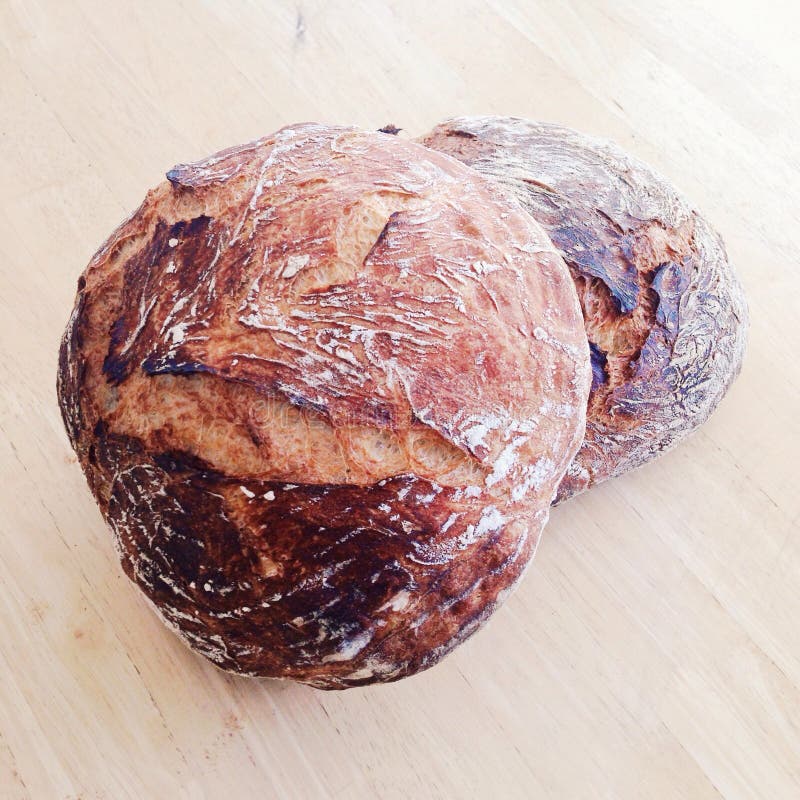 Two loaves of artisanal bread royalty free stock photo