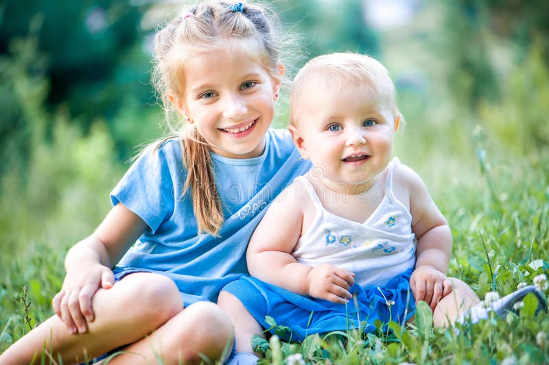 Two lovely sisters stock photo. Image of childhood, nature - 32367246