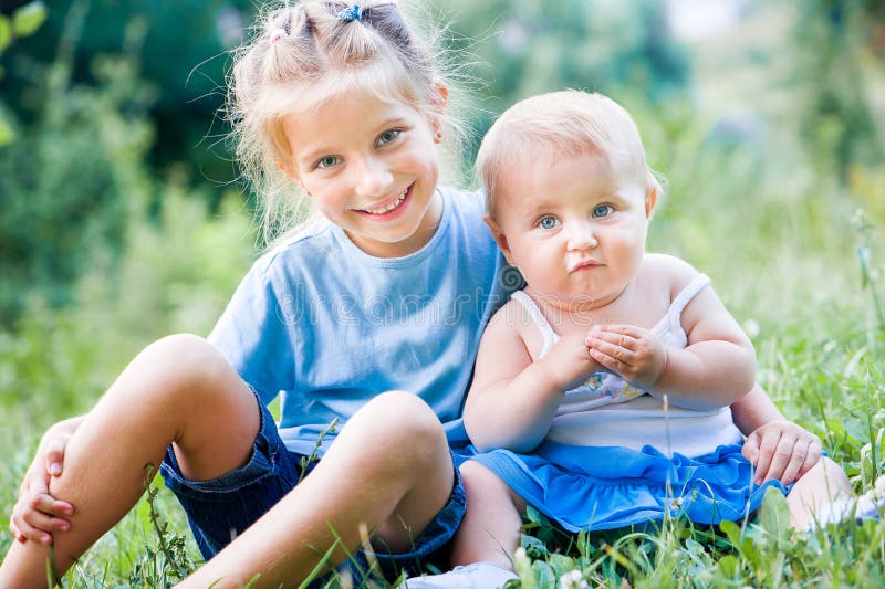 Two lovely sisters stock photo. Image of childhood, nature - 32367246