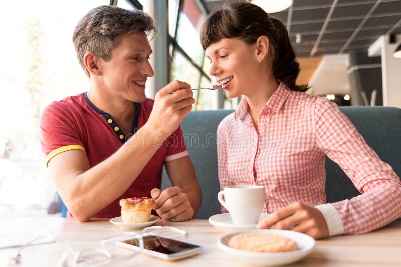 Two Lovers Chatting and Having Fun in the Cafe Stock Image - Image of