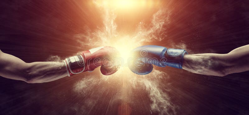 Two male hands in boxing gloves. Sports confrontation