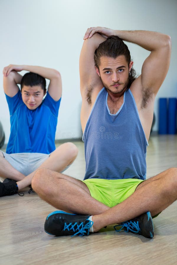 Two Men Doing Aerobic Exercise on Stepper Stock Photo Image of