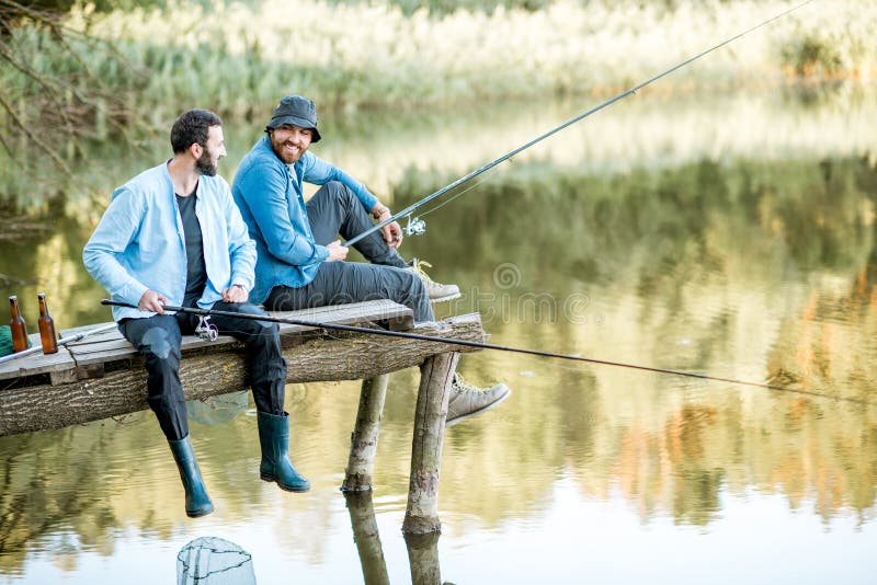 Two Men Fishing on the Lake Stock Photo - Image of together, person:  121184964