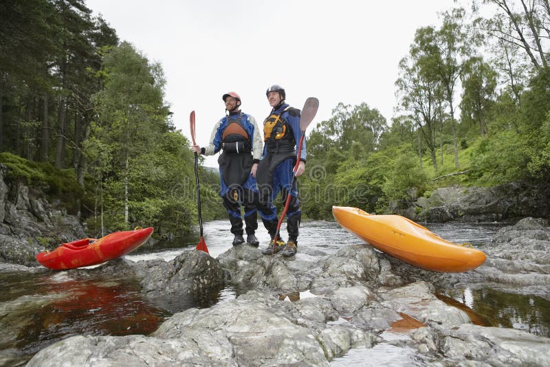 Men Carrying Kayak To River Stock Image Image of boating, kayaking