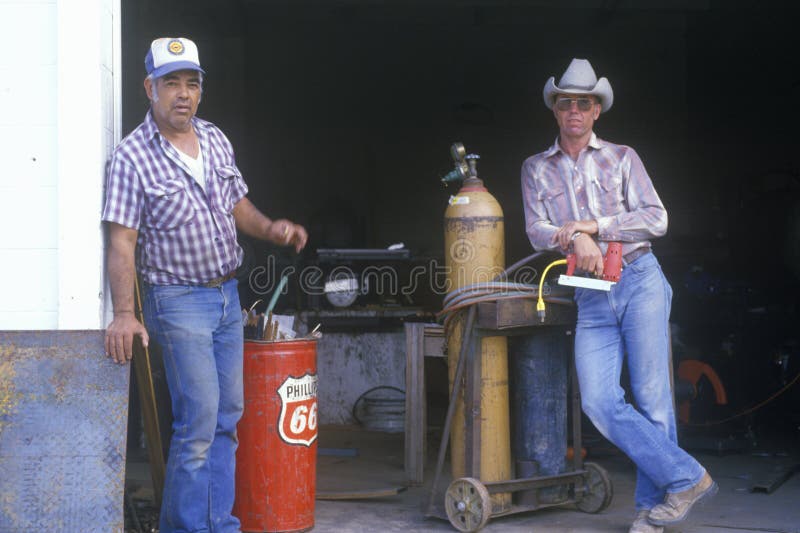 Two men at an old gas station royalty free stock photos Two men at an old gas station royalty free stock photos