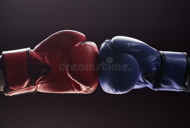 Two Men& X27;s Hands in Boxing Gloves. Confrontation Concept Stock