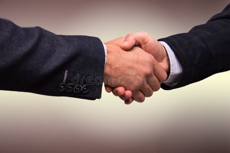 Two Men in Suits Shaking Hands Stock Image Image of partnership