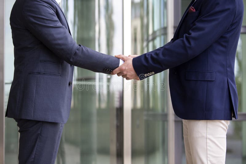 Two Men in Suits Standing Outside and Shaking Hands Stock Image Image