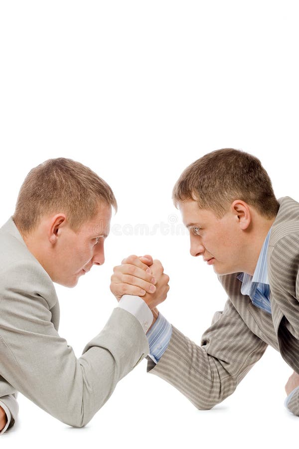 Two men wrestling with arms stock image Two men wrestling with arms stock image